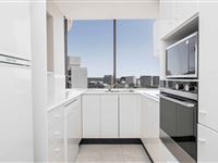 2 Bedroom Apartment City Side Kitchen-BreakFree Capital Tower
